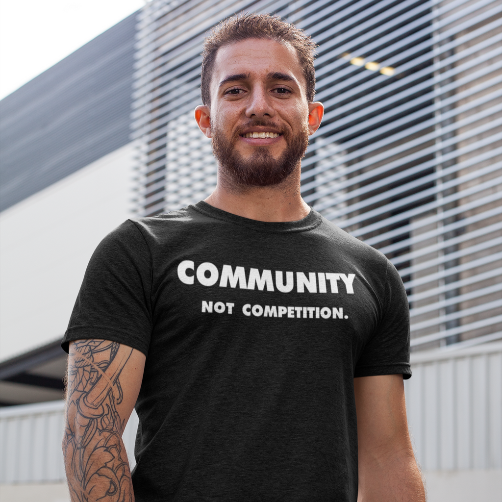 Tattooed man wearing Co-Op t-shirt